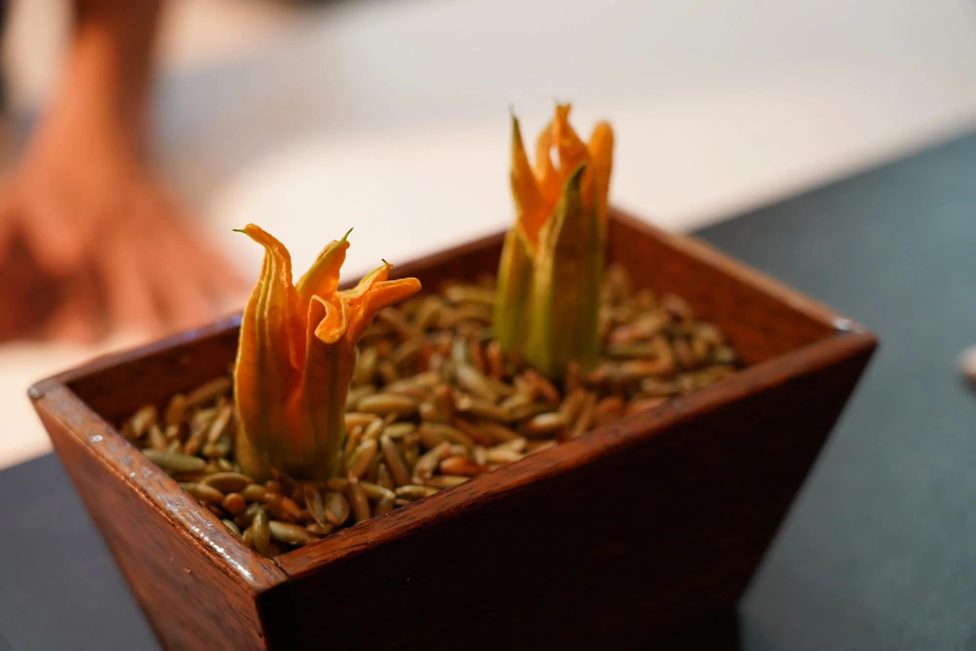 Part tempura, part fresh stuffed sweet Zucchini flower dessert.