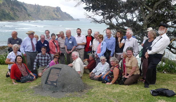 Photo Rodney Times: Ground-breaking research on the Greenwood’s former Pakiri cliff farm, in the background, brought the family into contact with radio astronomers at the plaque unveiling at the Leigh Marine Reserve.