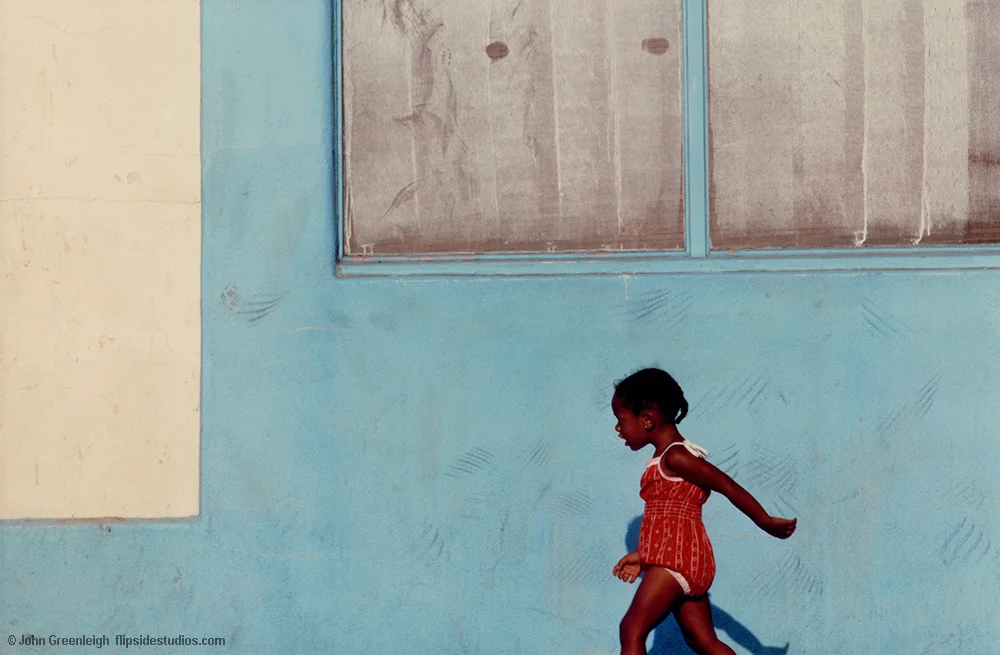 girl_blue_wall_lo.jpg