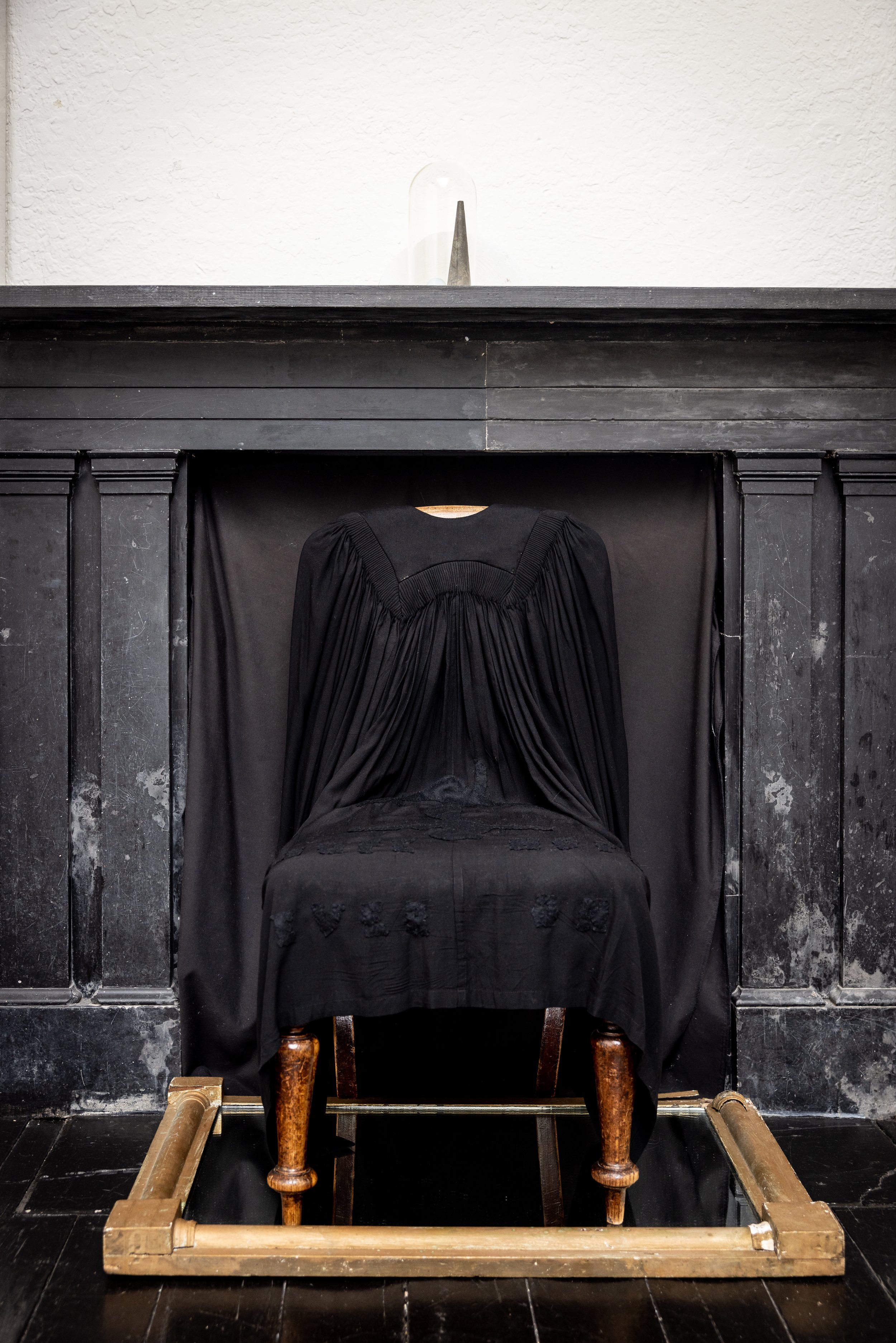  Jo Chew,  Foul anchor , 2023, antique chair, mirror, academic gown, cloth, embroidery thread, dimensions variable   