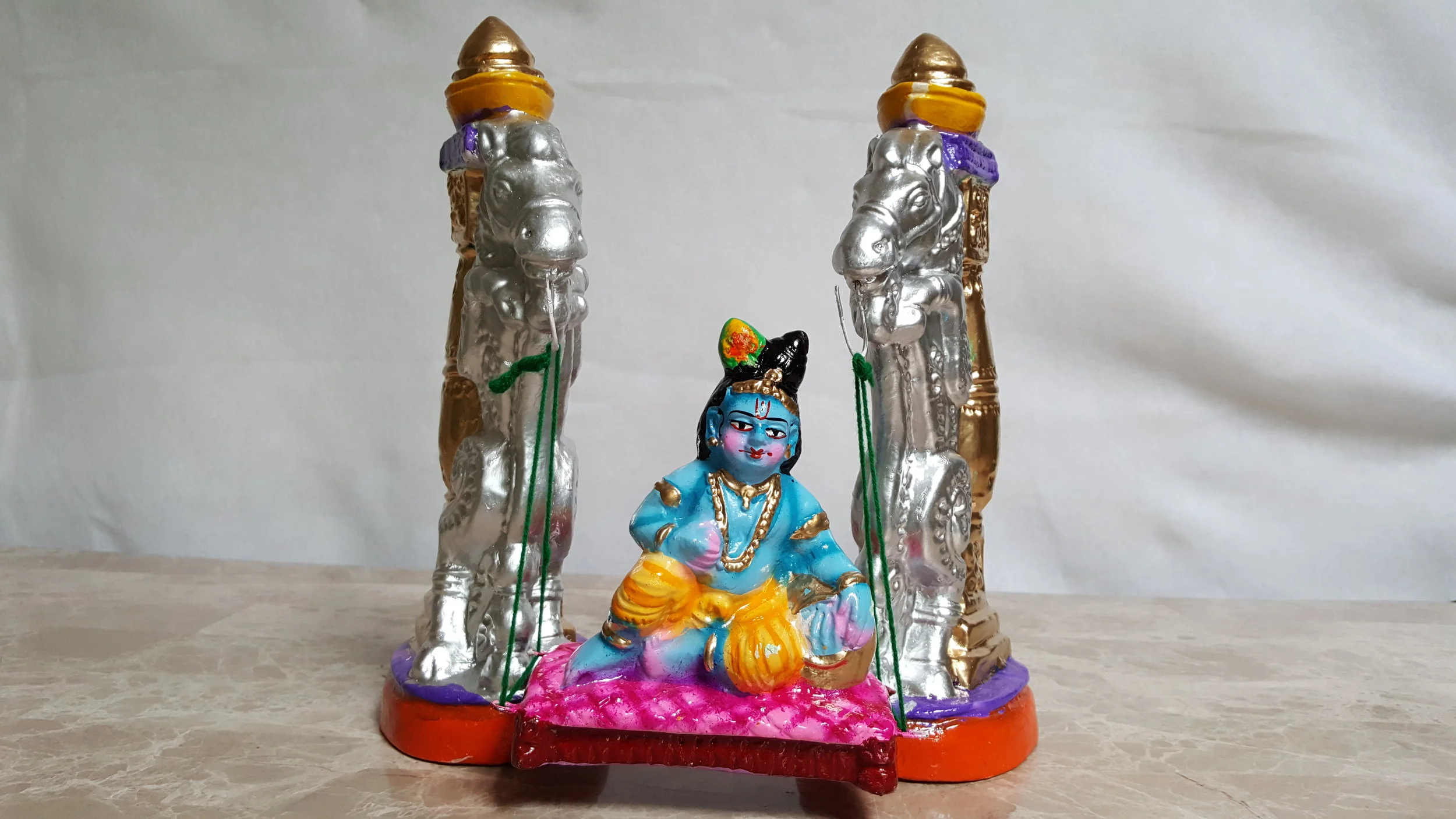 Krishna on swing