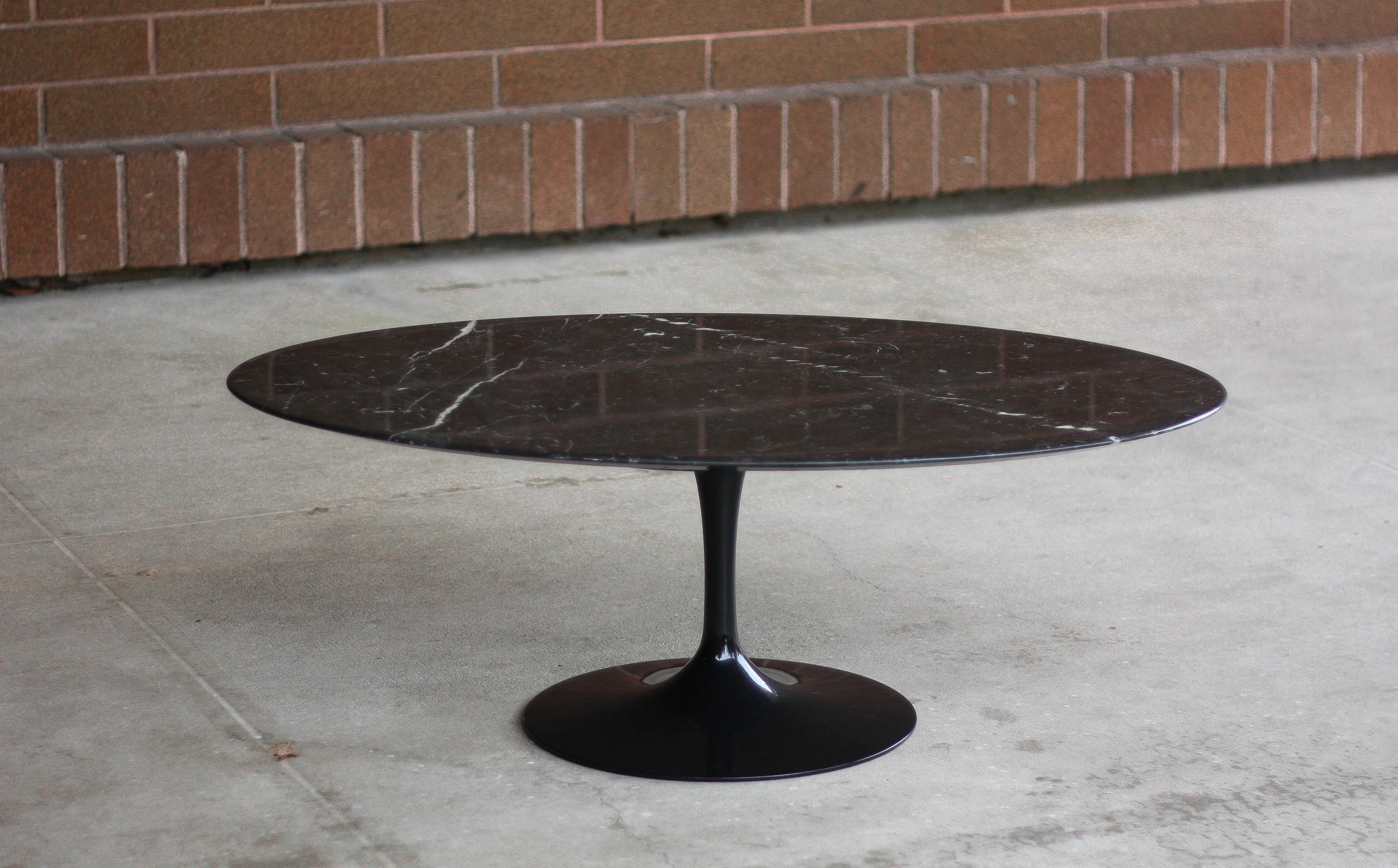 EERO SAARINEN FOR KNOLL BLACK MARBLE TULIP COFFEE TABLE — Mid And Mod