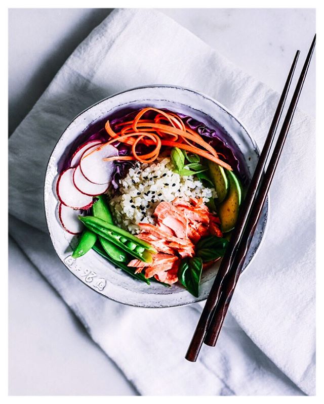 The recipe for these Sesame Ginger Salmon Bowls is on the blog today and it&rsquo;s quickly becoming my new favorite lunch! Built on a bed of riced cauliflower, these bowls call for the kitchen sink of thai-inspired ingredients. I like to load mine w