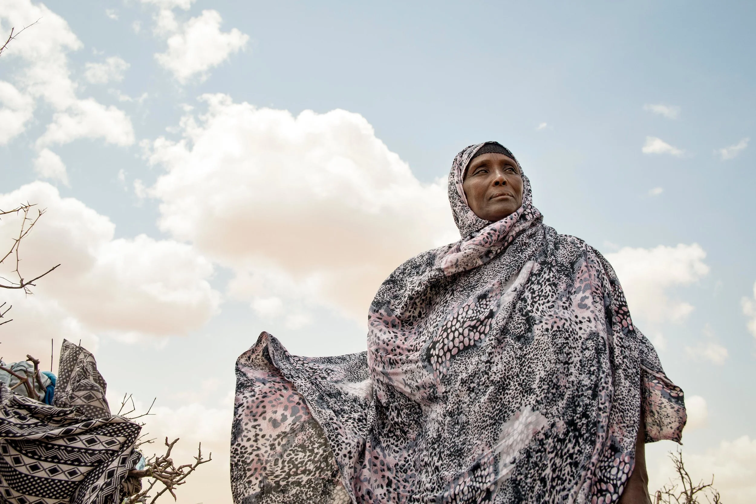 Samey Alasow, 50, stands outside her home on the outskirts of Hadado Town in Northern Kenya. Recurrent droughts in the Horn of Africa have led to poor crop production and widespread food insecurity. More than 2.6 million Kenyans lack reliable access to nutritious food according to the United Nations. That number is expected to rise in the coming months.