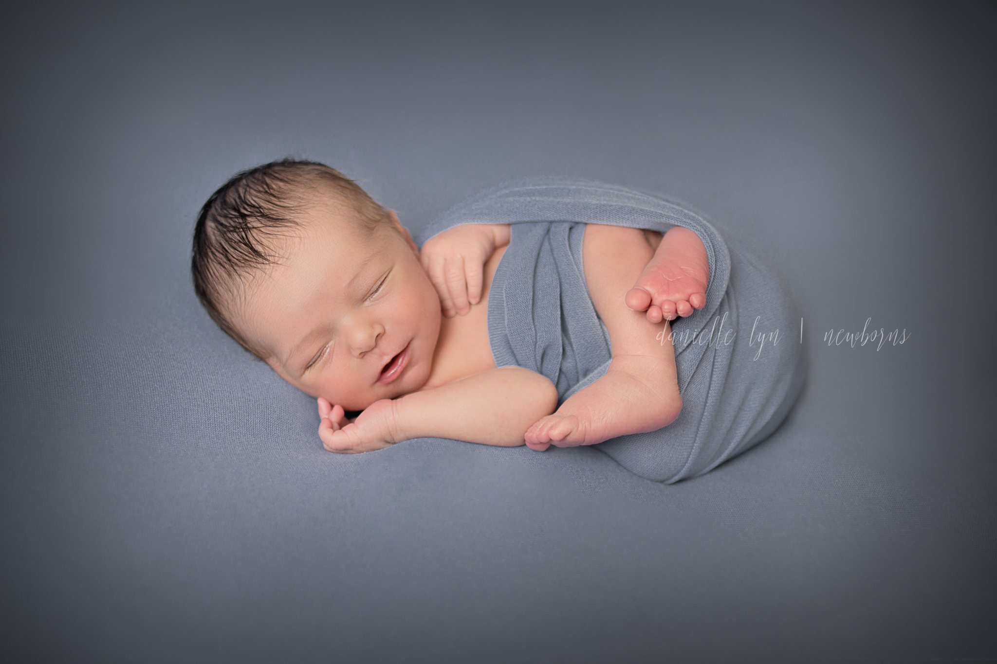 He gave me smile after smile.... almost like he knew where he was and what he was there for..... his first photographs showing off just how perfect he truly is. I am so thankful to be part of the beginning of this family's amazing journey into parenthood. You two truly have no idea the adventure that lies ahead.... life's greatest adventure. Enjoy it! 