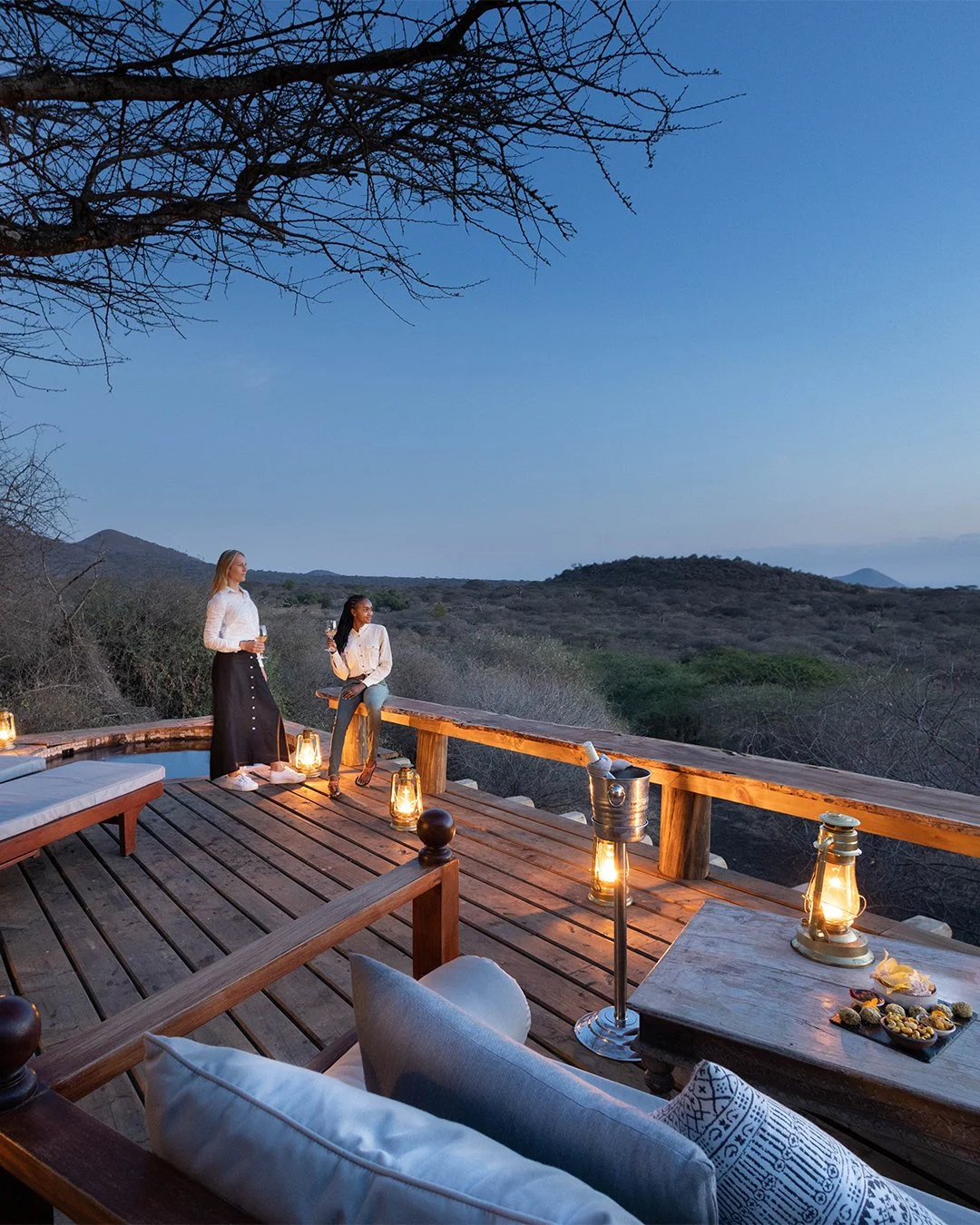 Perched high above the plains at ol Donyo Lodge, the world stretches out in every direction. Here,  you can watch as elephants trace ancient paths below, giraffes move across the horizon, and the light shifts over Kenya's Chyulu Hills. It&rsquo;s a f