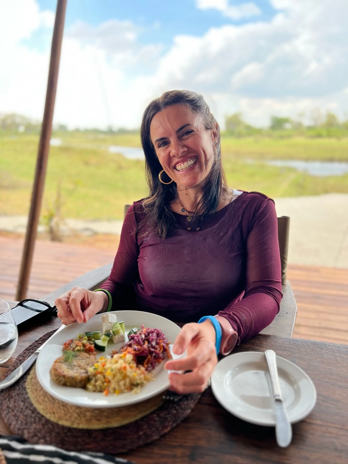 Having lunch at Okavango Explorers after a stunning game drive with the Great Plains Conservation guides.
d&amp;b Clothing: Silvia Mesh Top in Burgundy 
Model: @eluisadib 
Photographer: @kellybraby 
Botswana: @greatplainsconservation Okavango Explore