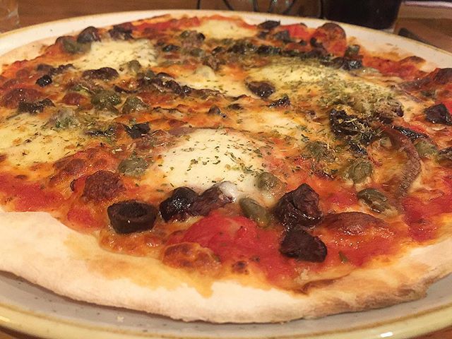 Pizza weather? Then this tasty  Alle pizza - topped with pizza sauce, mozzarella, fior di latte, Sicilian anchovies, capers, black olives and oregano would be perfect - from 11 Inch Pizza in Melbourne CBD #pizza #eat #italianfood #anchovies #cheese #