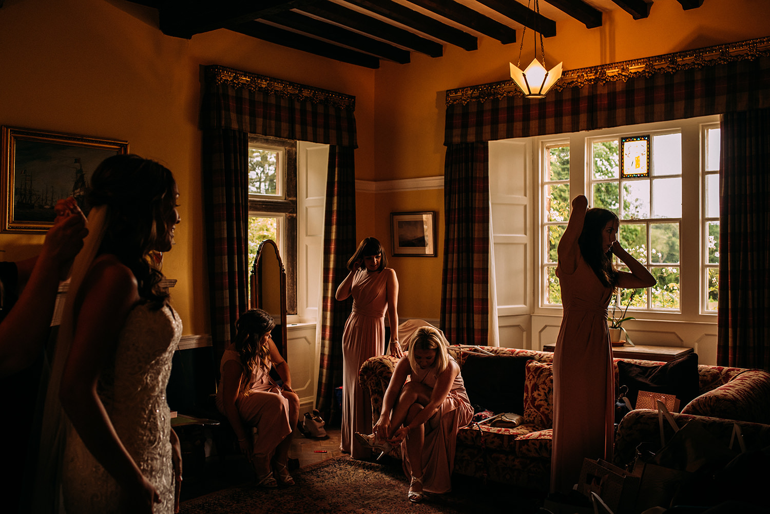  award winning colour photo of bride and bridesmaids getting ready 
