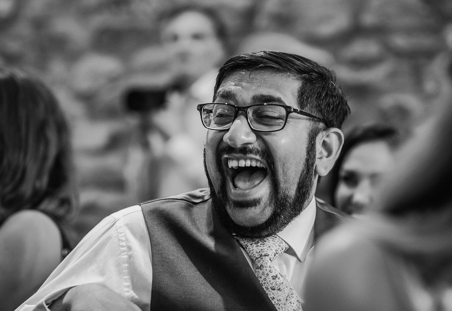  black and white photo of friend laughing 