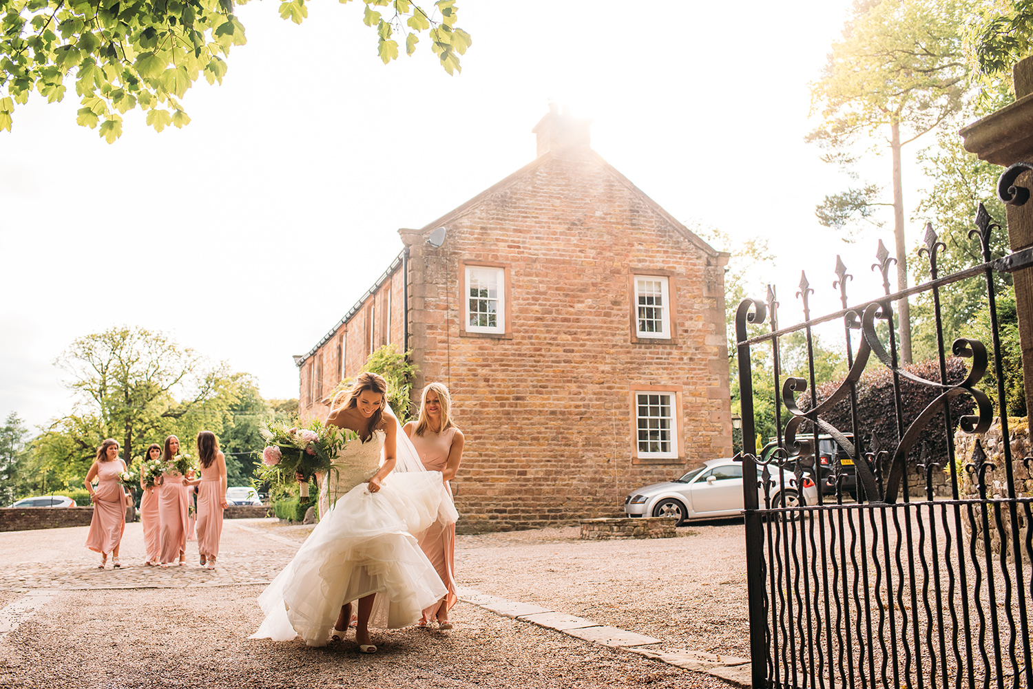  colour photo, bride and bridesmaids walking 