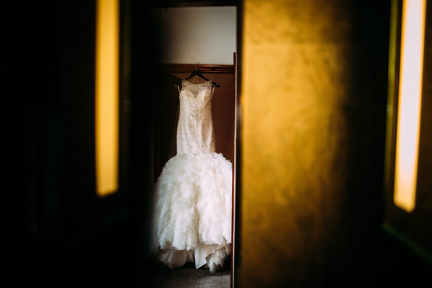 wedding dress hanging up