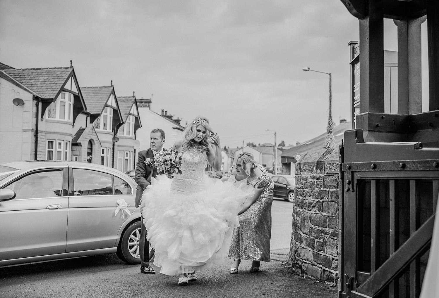 Bride and bridesmaids walking up church path