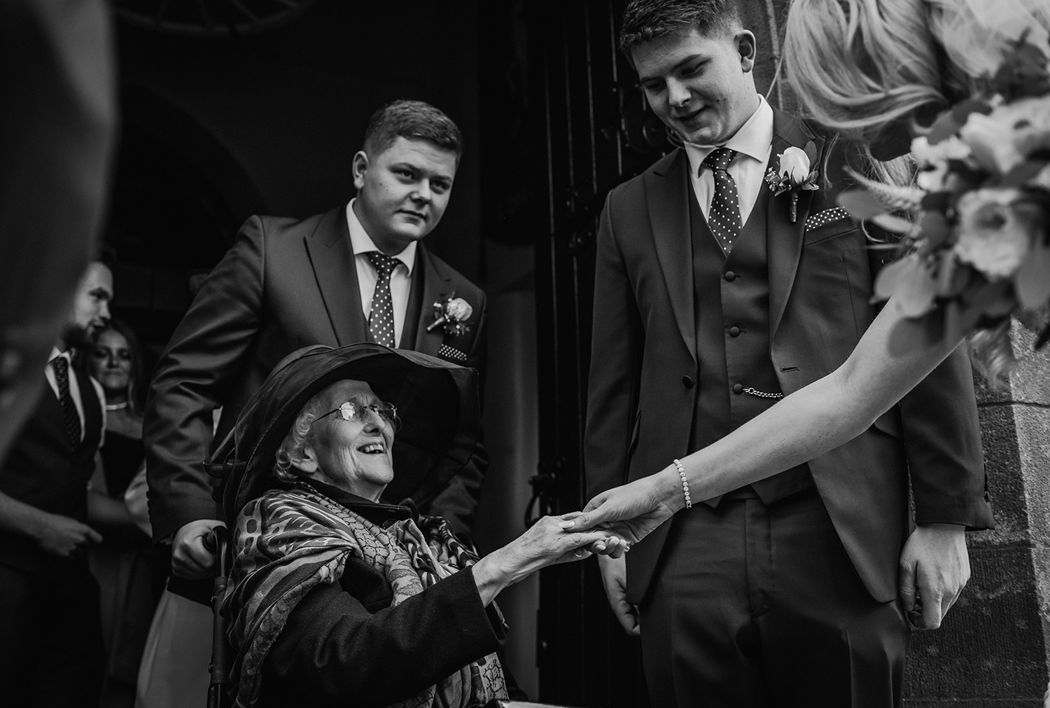 bride holds grandparents hand