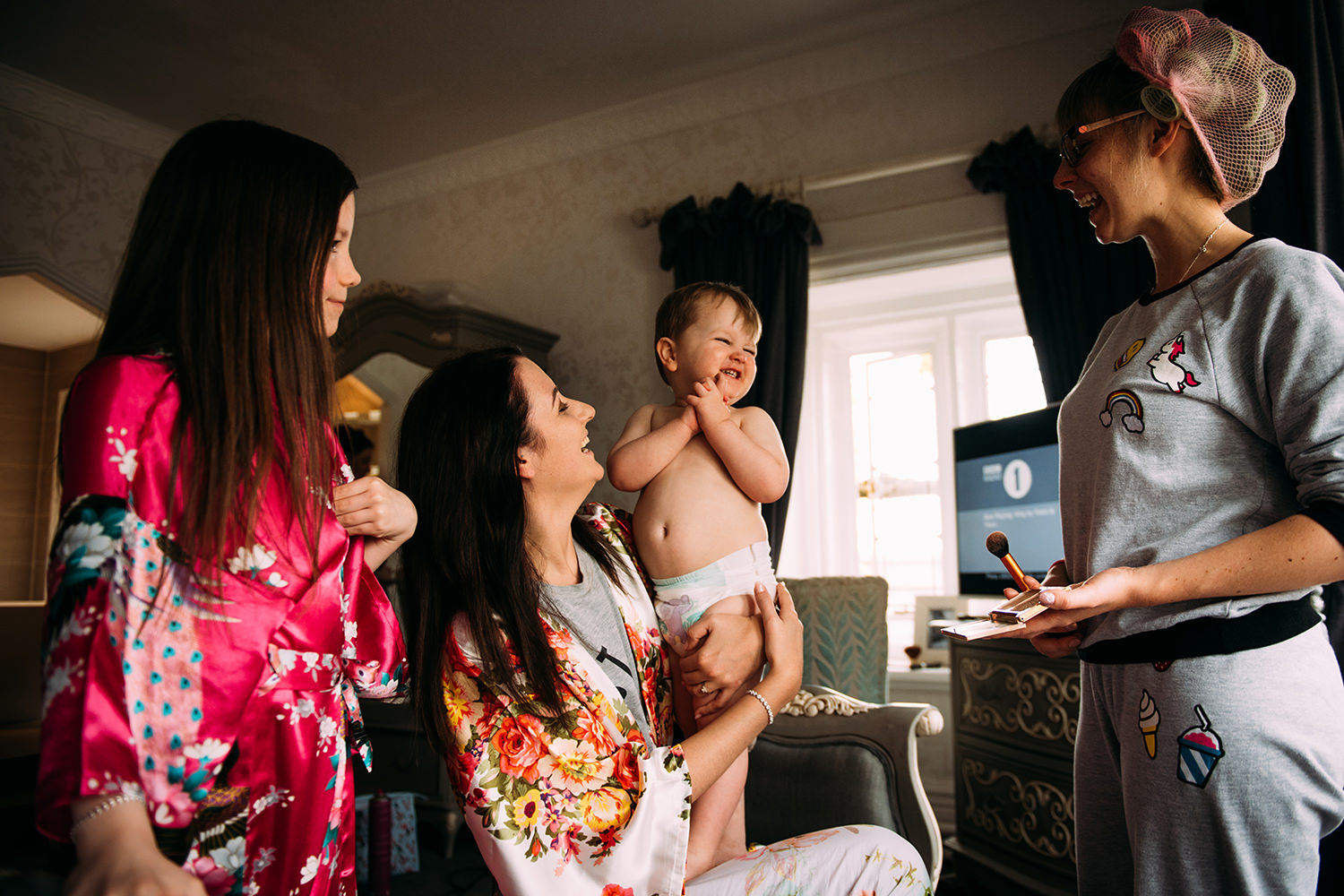 Bride with son laughing