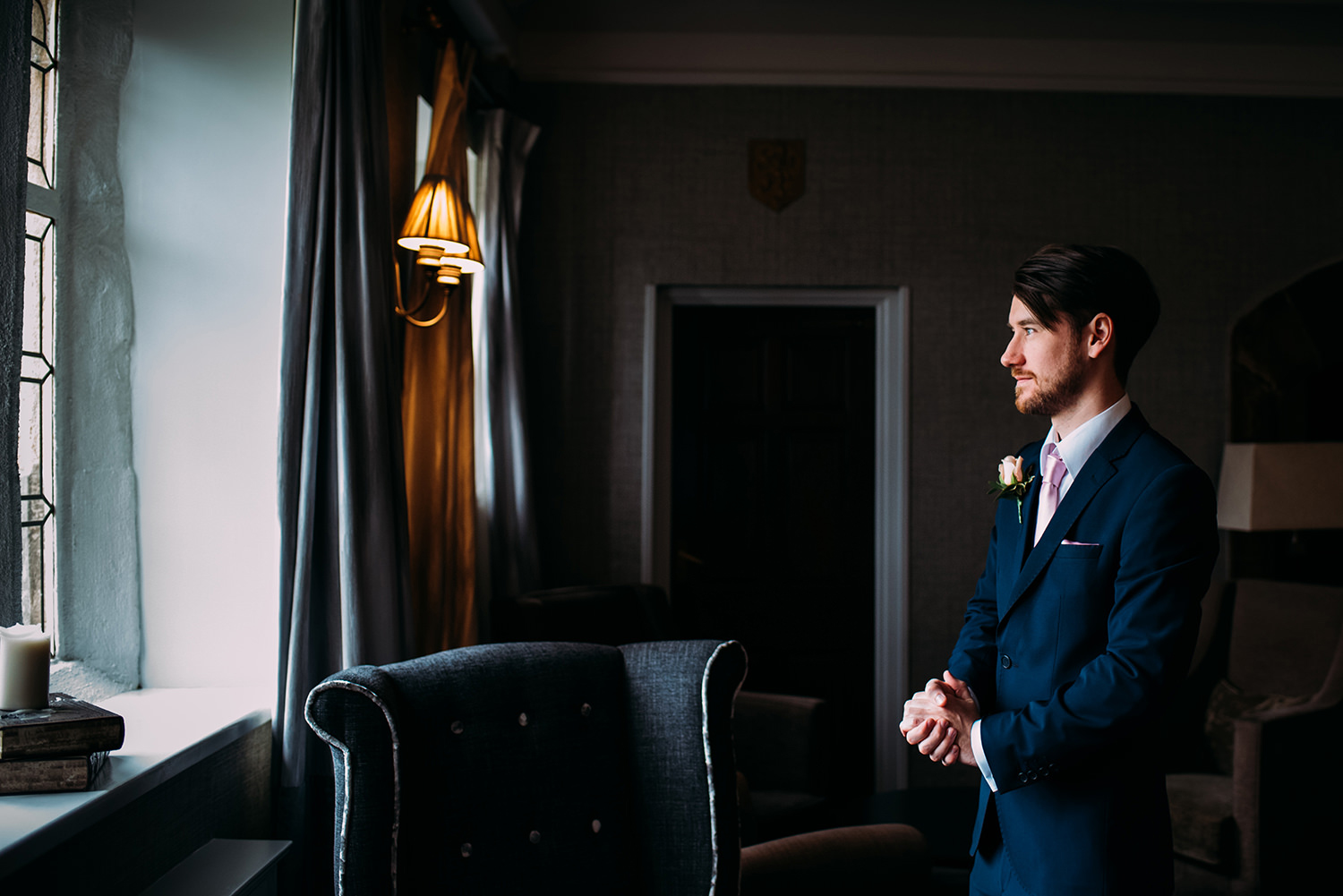 Groom looking out of the window
