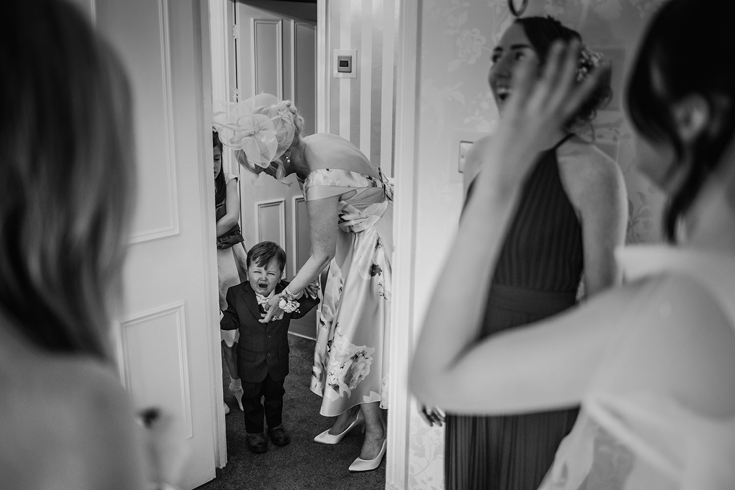 bride's son crying as he see's his mum in a dress