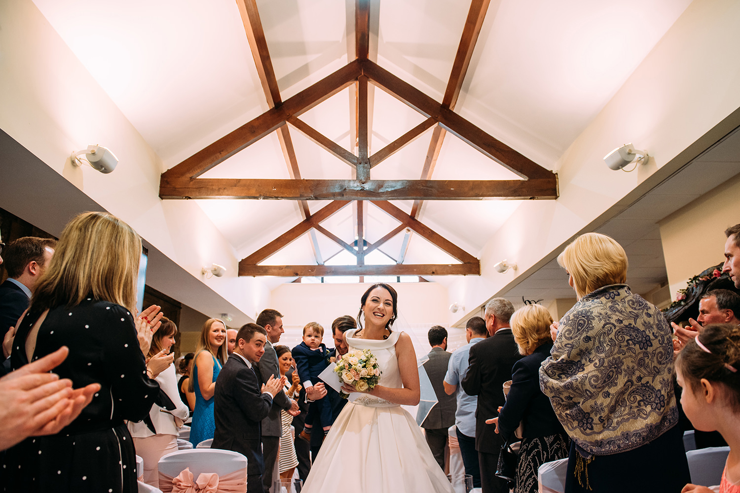 bride and groom walking up the aisle