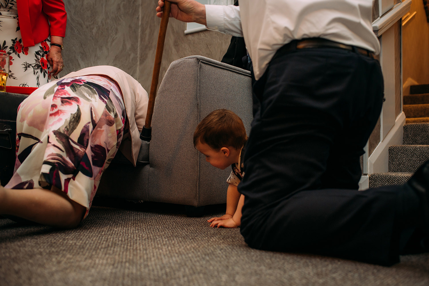  boy crawling after grandma 