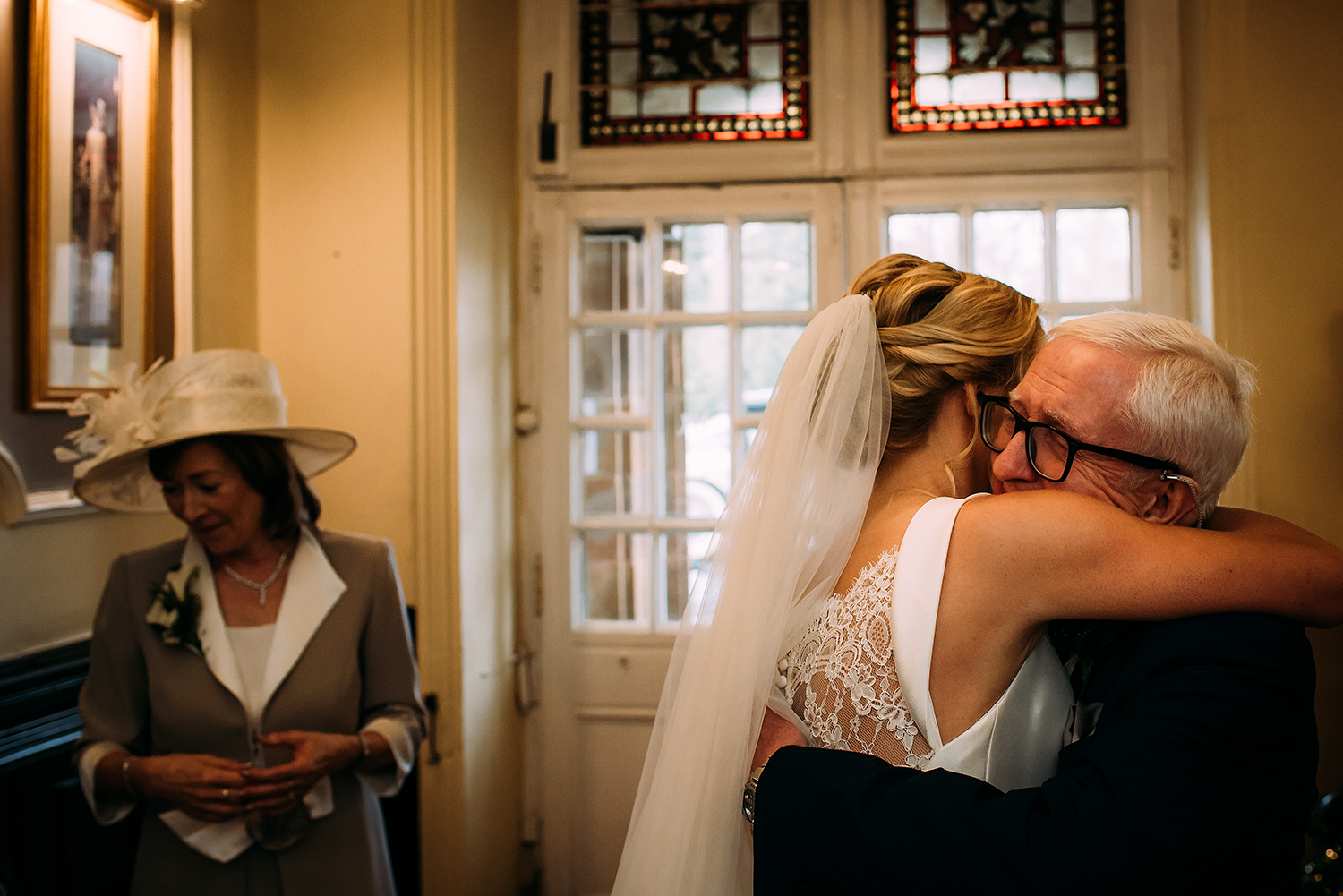  bride hugging father 