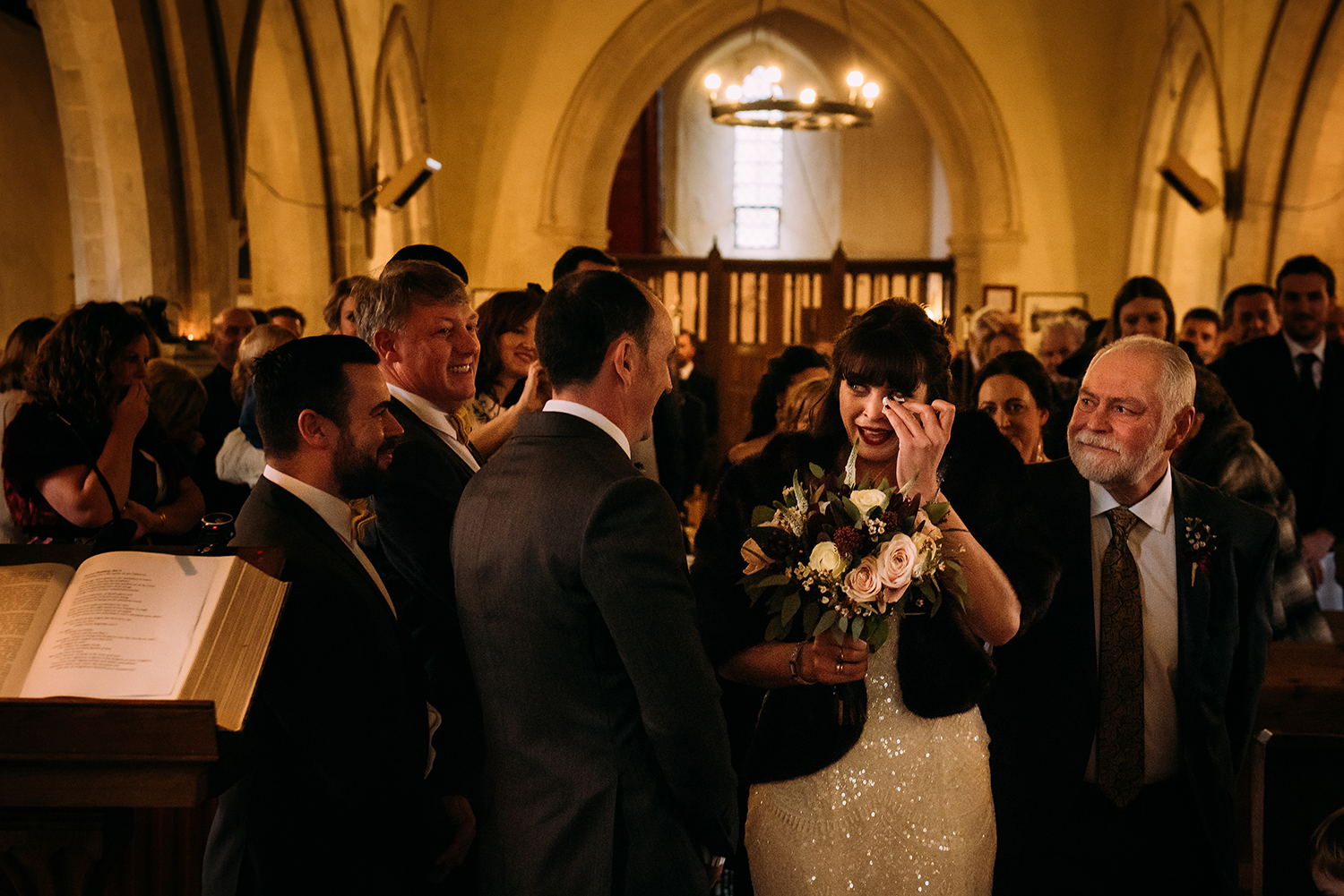 emotional bride arrives at church and wipes eyes