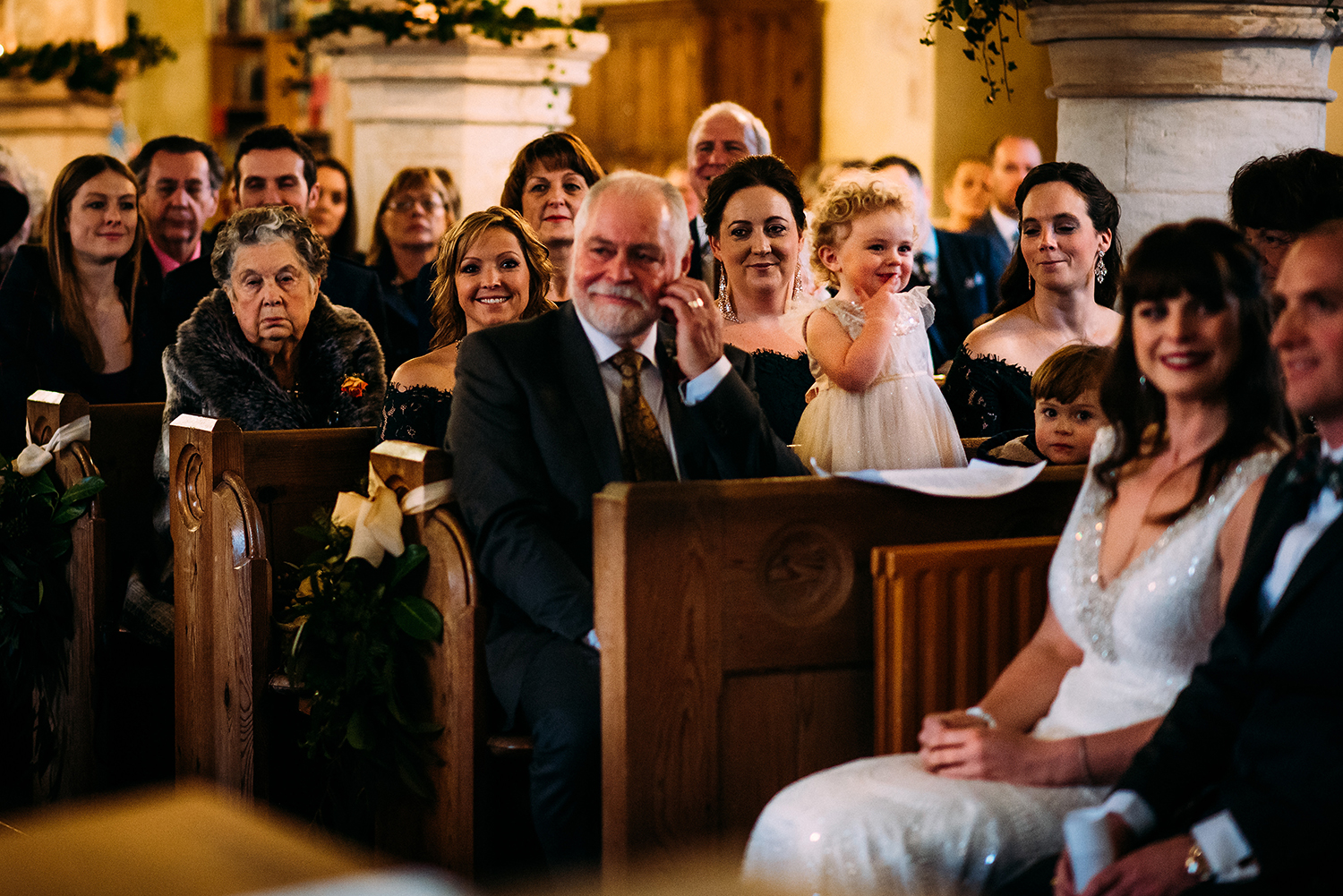 bride and grooms daughter being cheeky again, now copying grandads shhh