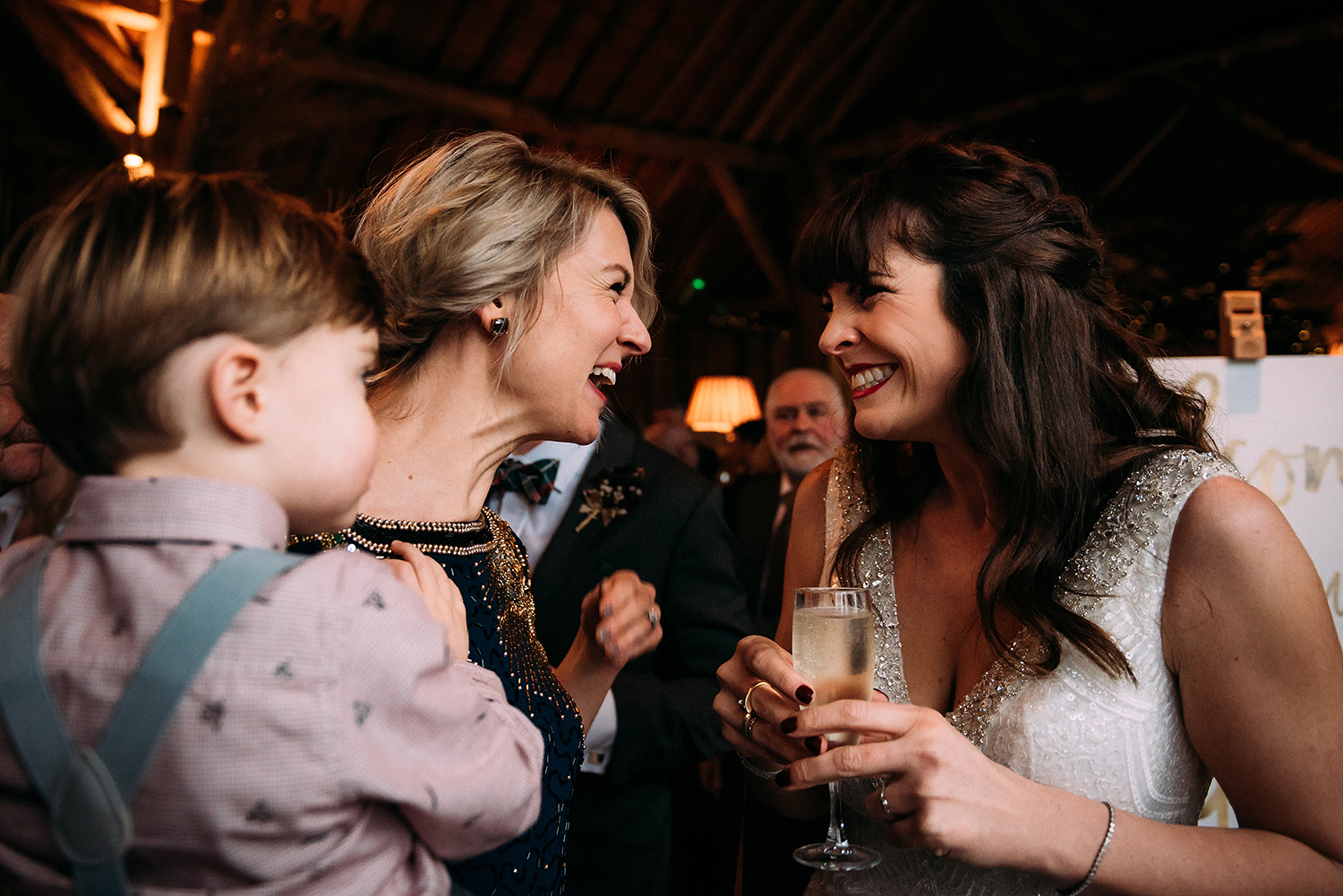 bride and friends laughing