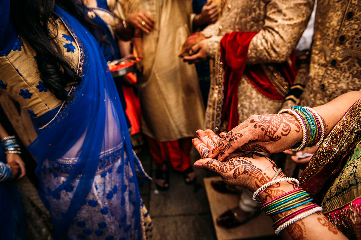  hands with Indian henna tattoe’s 