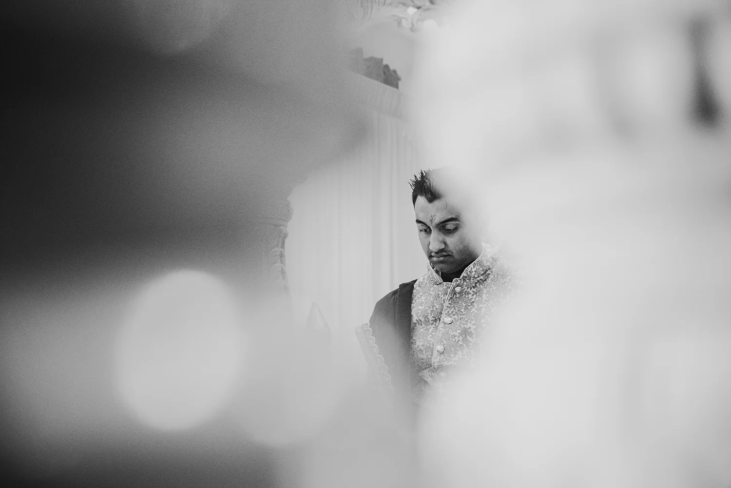 bw photo of nervous groom