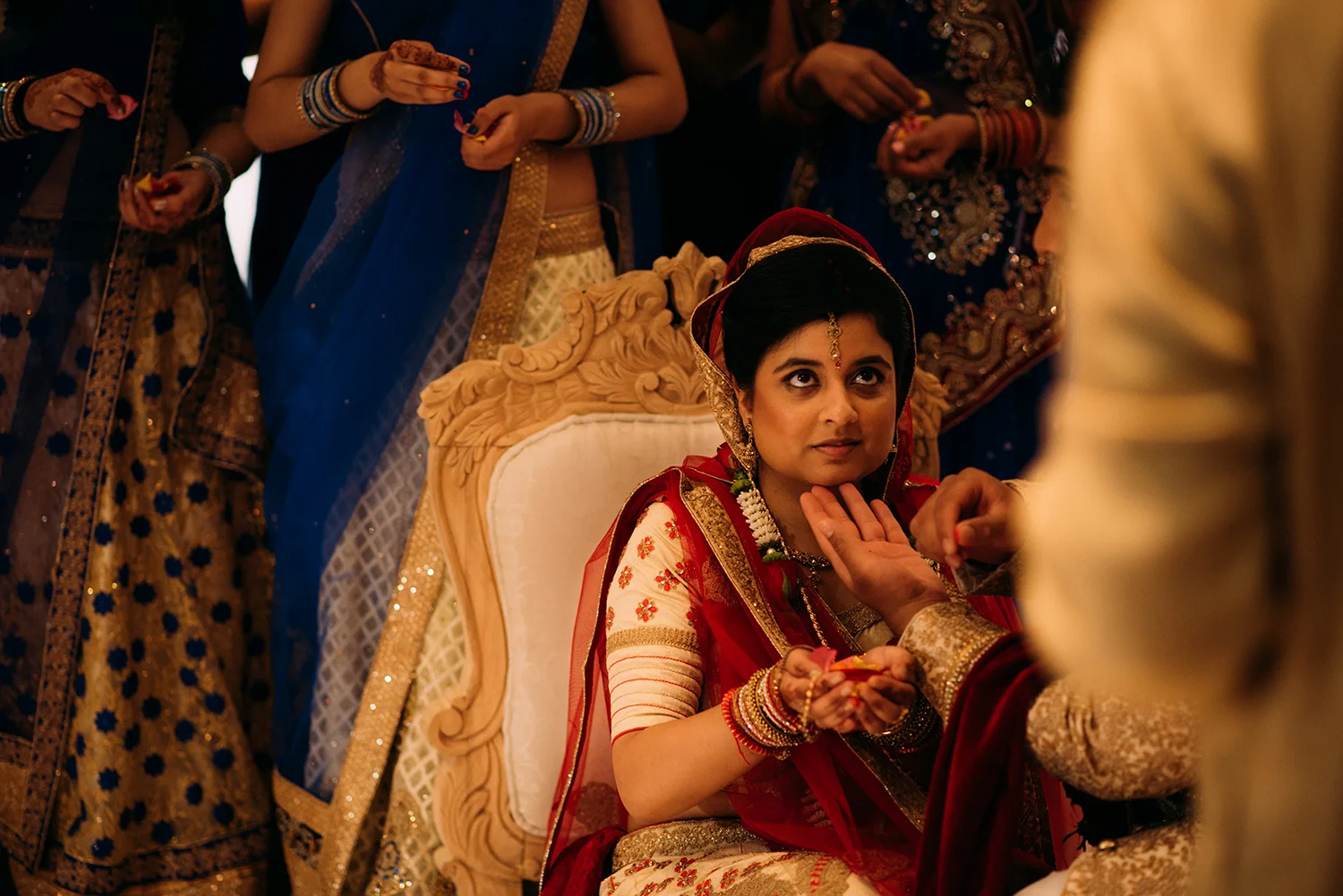 groom touching the brides chin
