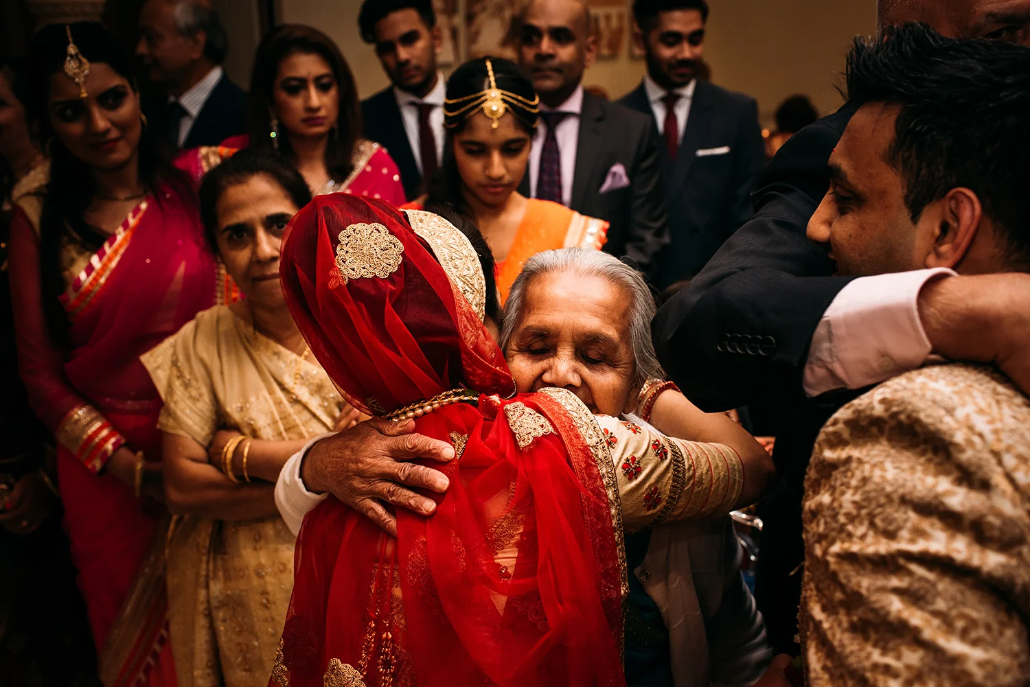 emotional image of bride hugging a relative
