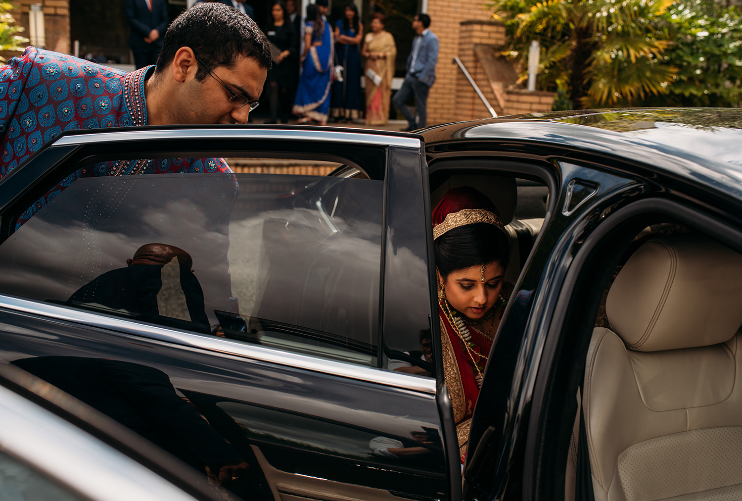  bride in wedding car 