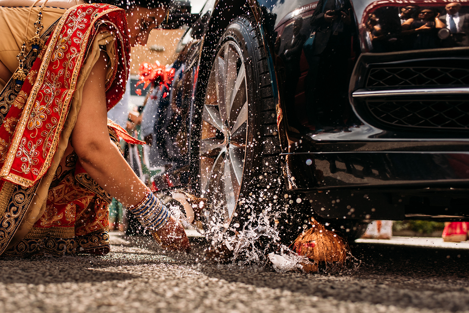  coconut exploding under the car tyre 