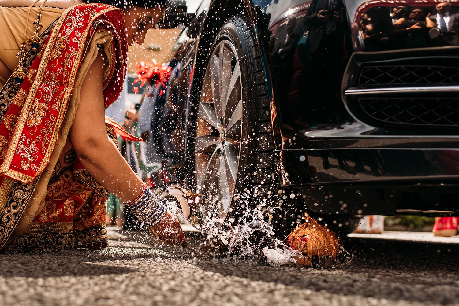 coconut exploding under the car tyre