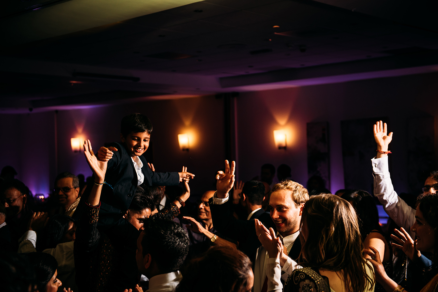  boy lifted above the dance floor 