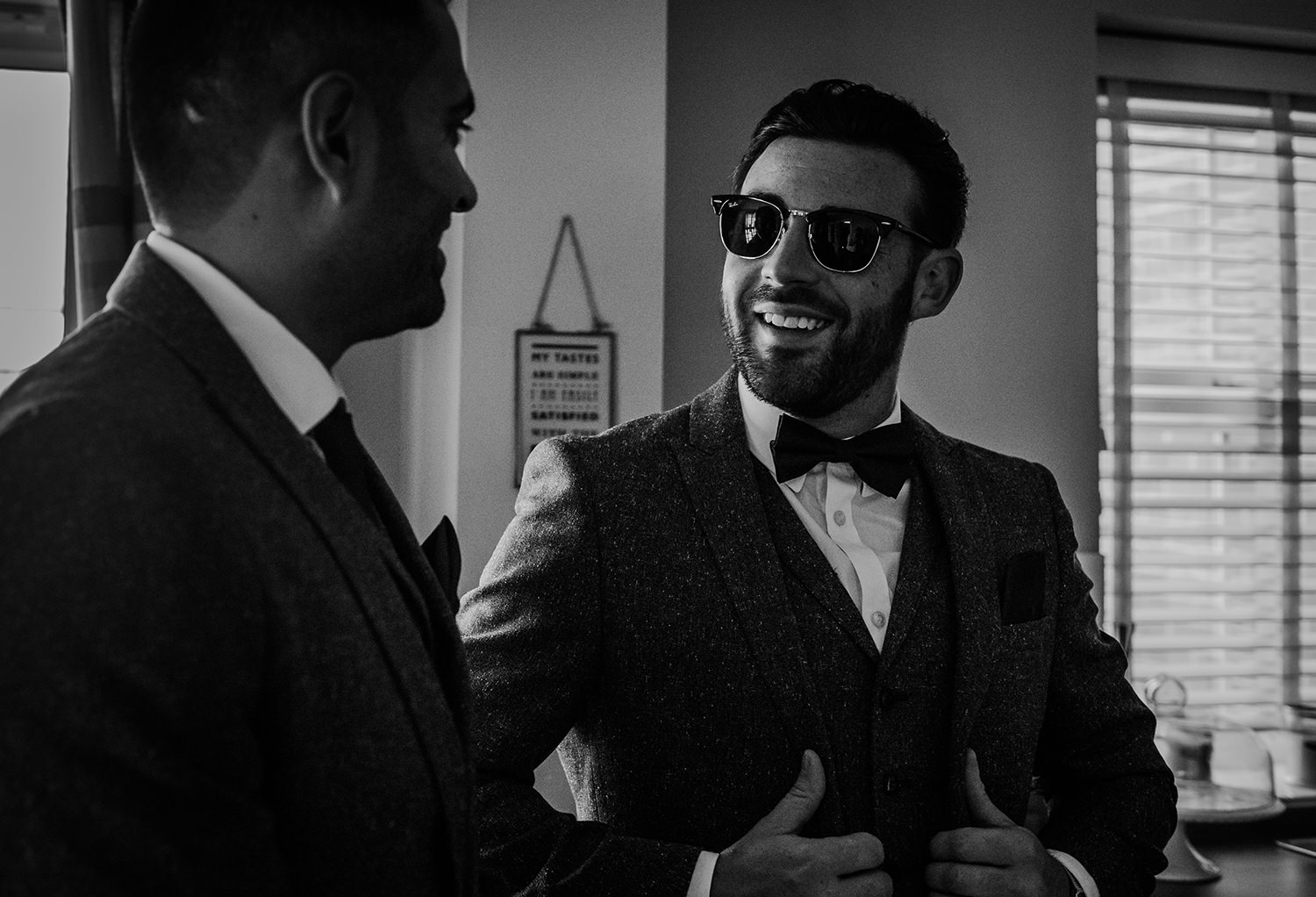  bw photo of the groom with his best man 