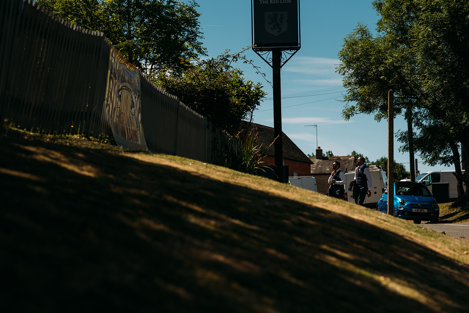  the groomsmen entering the pub 