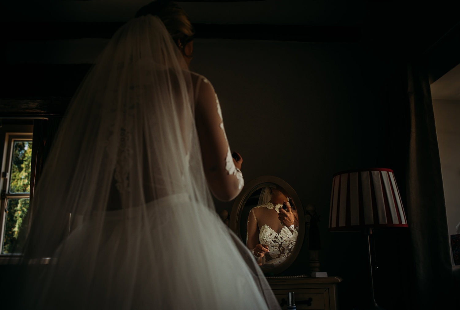  bride putting on perfume 