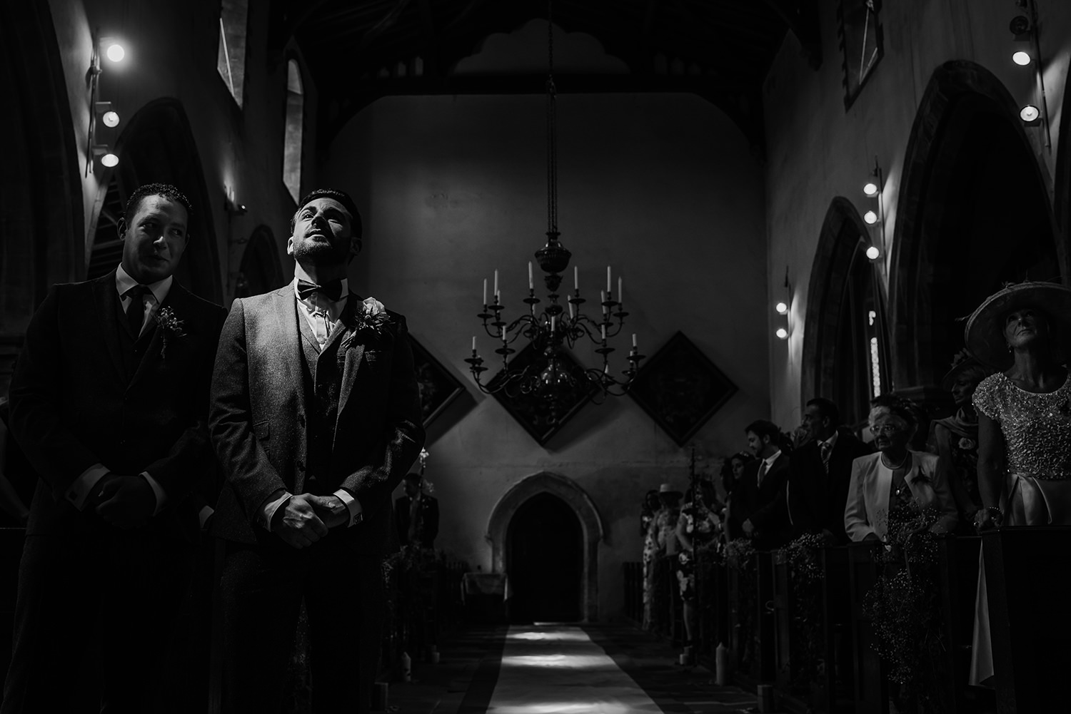  bw photo. Nervous groom takes a deep breath 