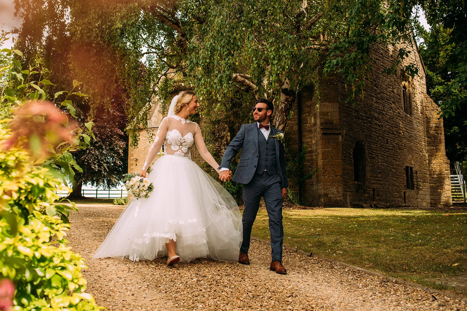 bride and groom walking to the reception