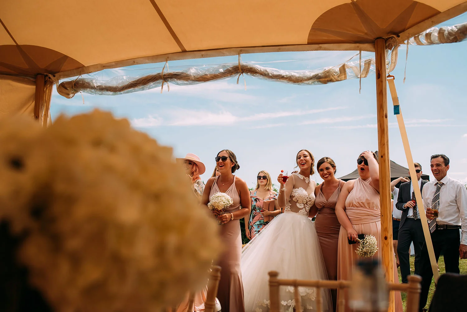 bride and friends laughing