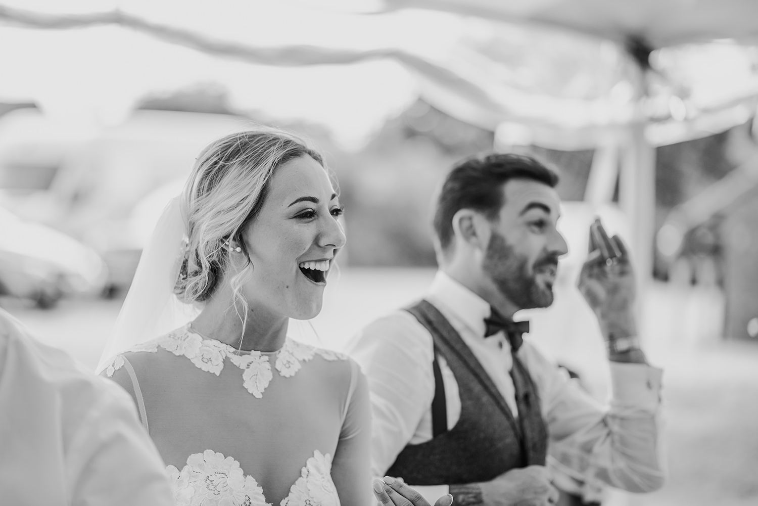  bw photo bride and groom laughing 