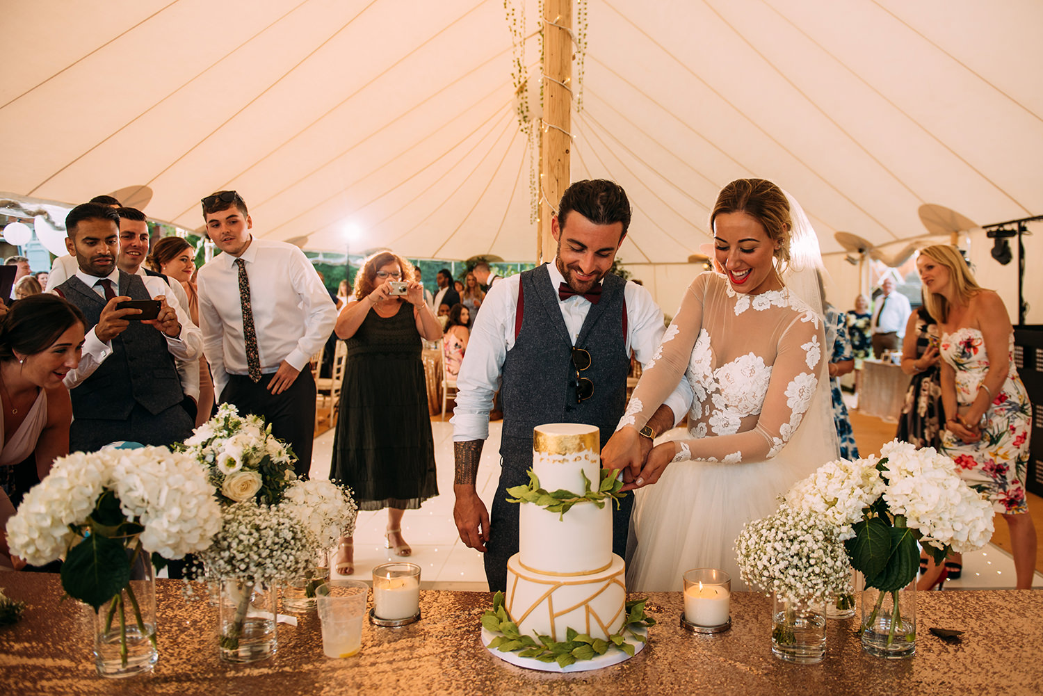  bride and groom cut the cake 