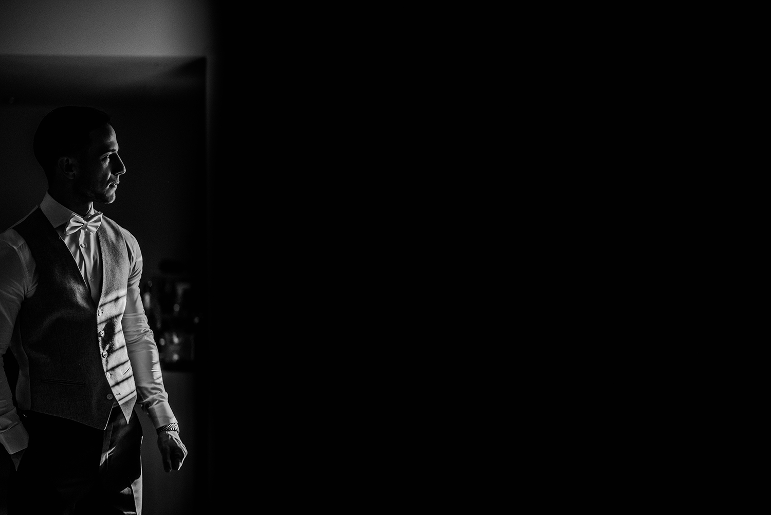 bw portrait of the groom