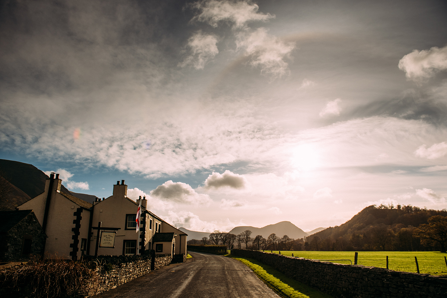 new house farm with moody clouds