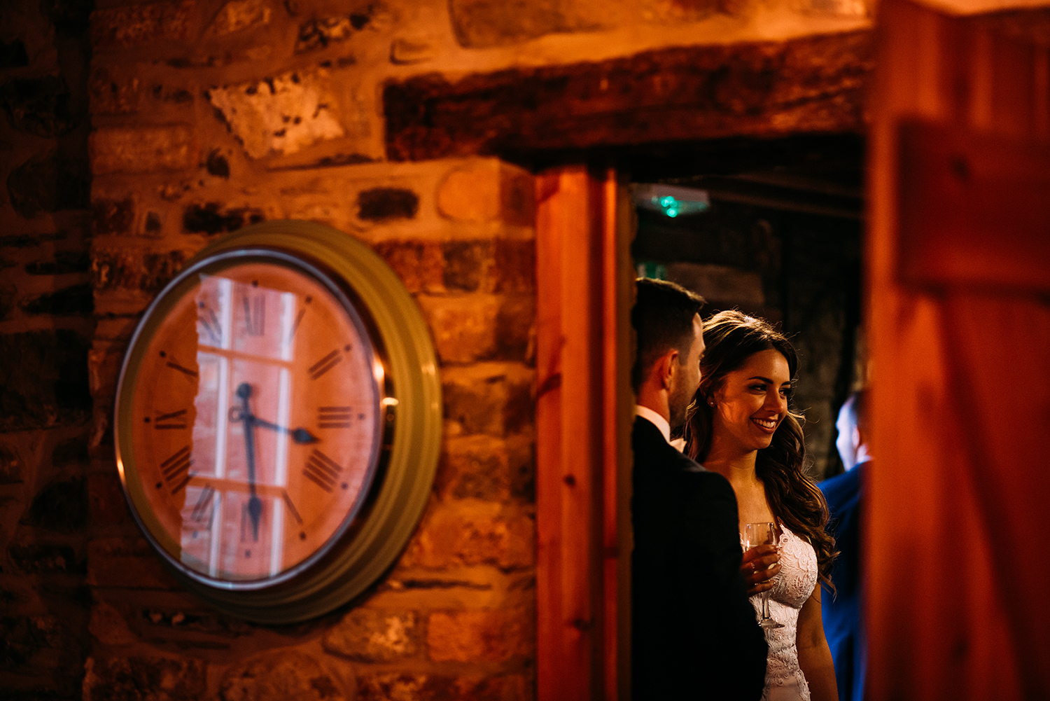 bride and groom chatting to guests