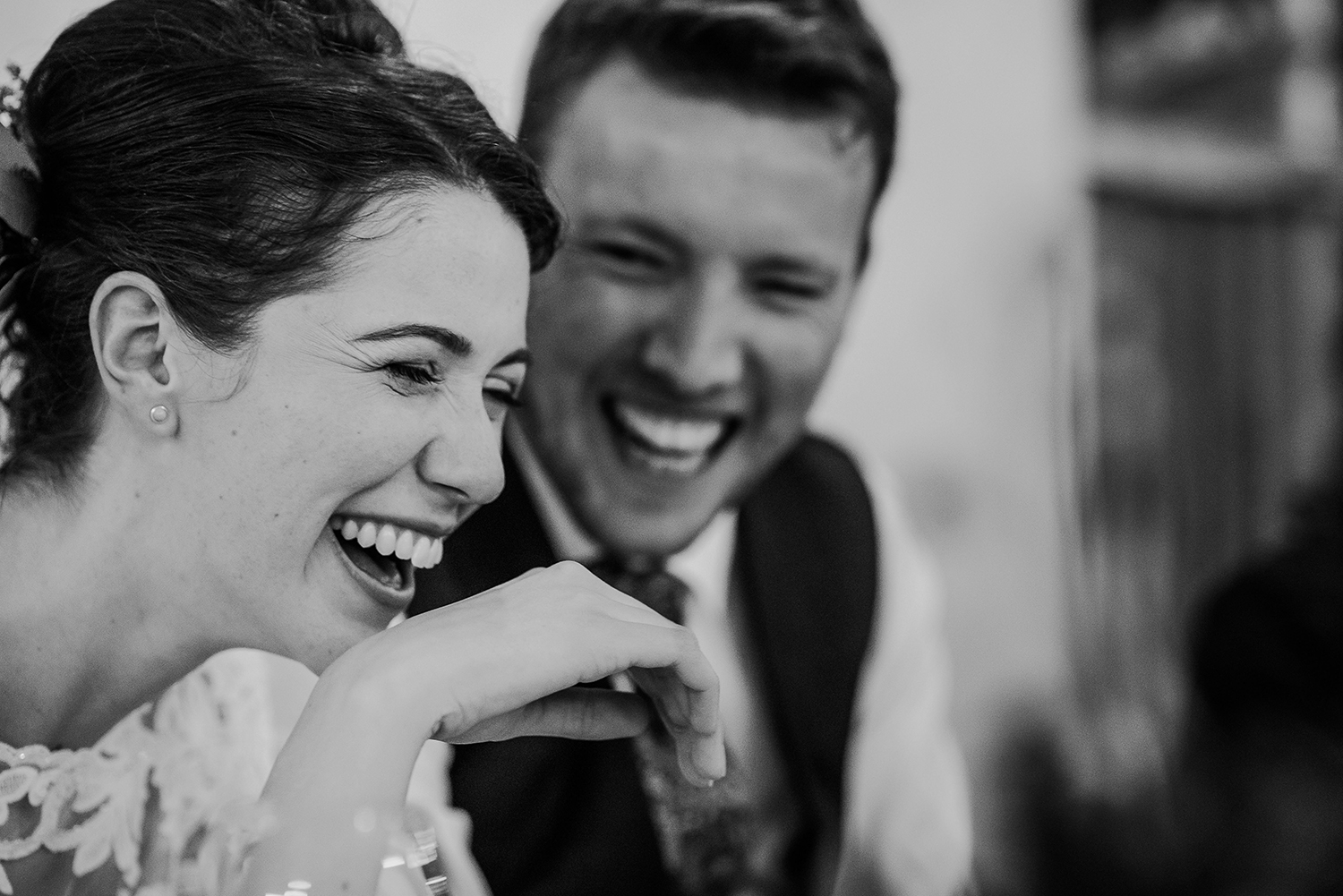  BW photo, bride and groom really laughing 