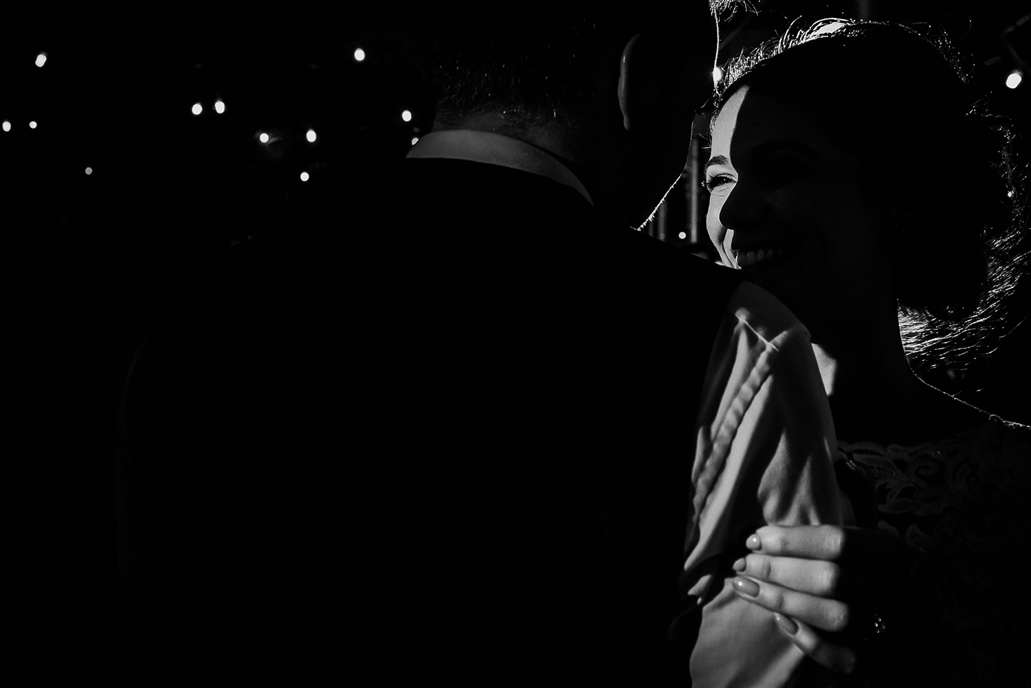 bw photo. The light just hitting one of the brides eyes during the first dance