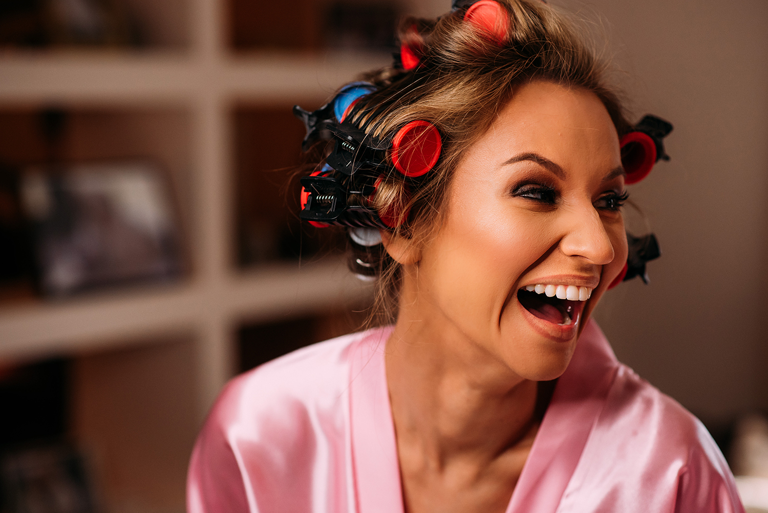 Bride laughing during the morning prep shots