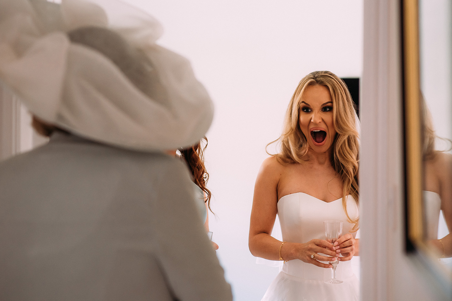  bride reaction to her mother in her outfit 